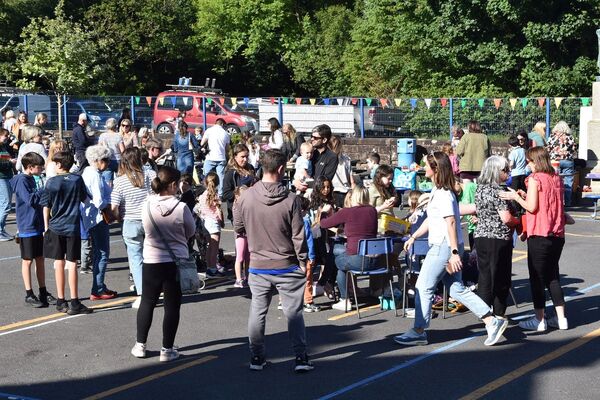 Summer sunshine attracts a crowd at school fete