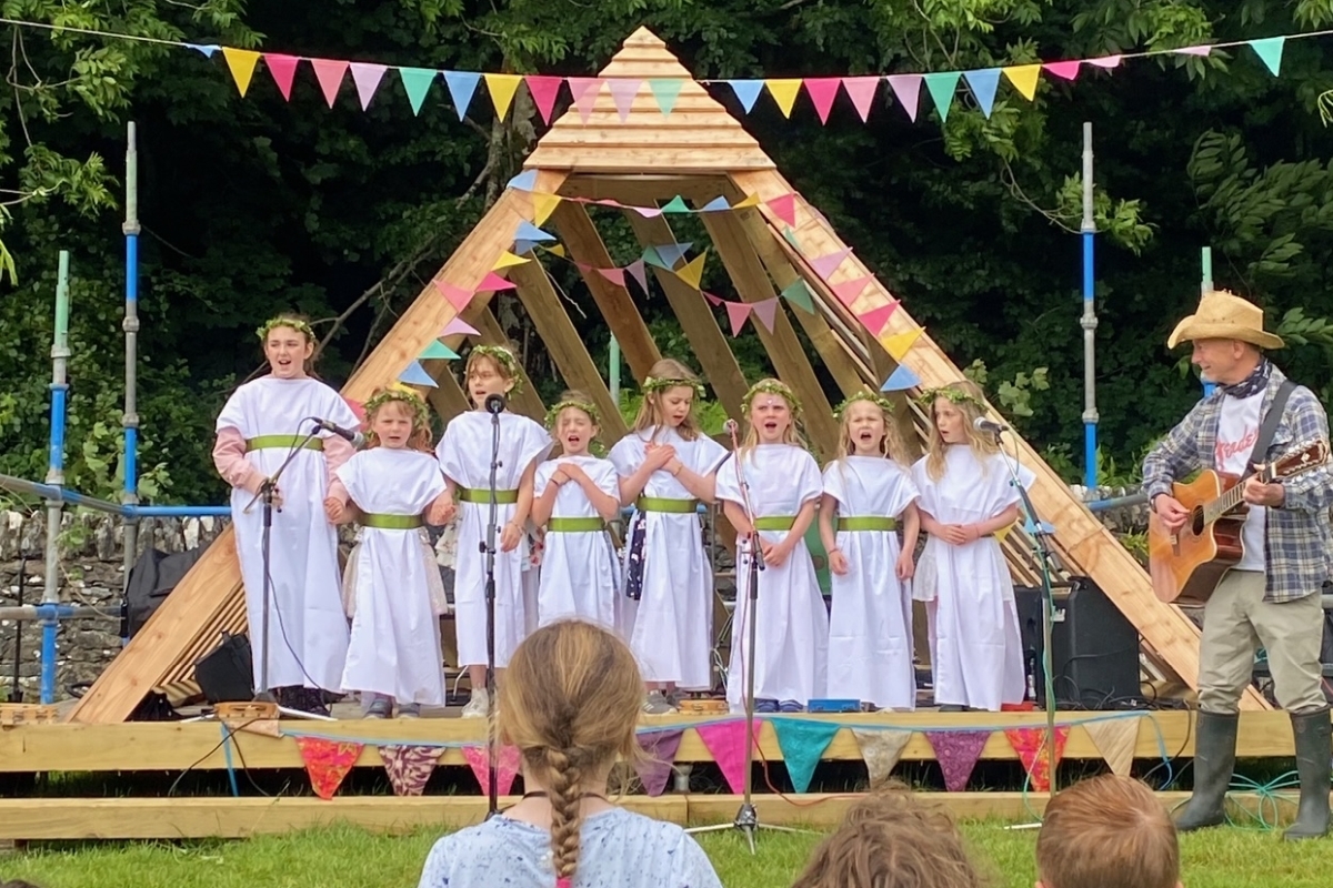 The Wee Druids perform with accompaniment by Davey Garner. Photograph: Kilmartin Primary School