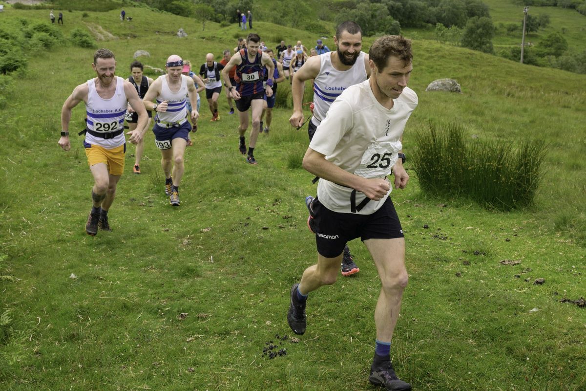 Race winner Tom Owens from Shettleston Harriers leads the charge at the start of the Eagles Crag Hill race. Photograph: Phil Hughes.
