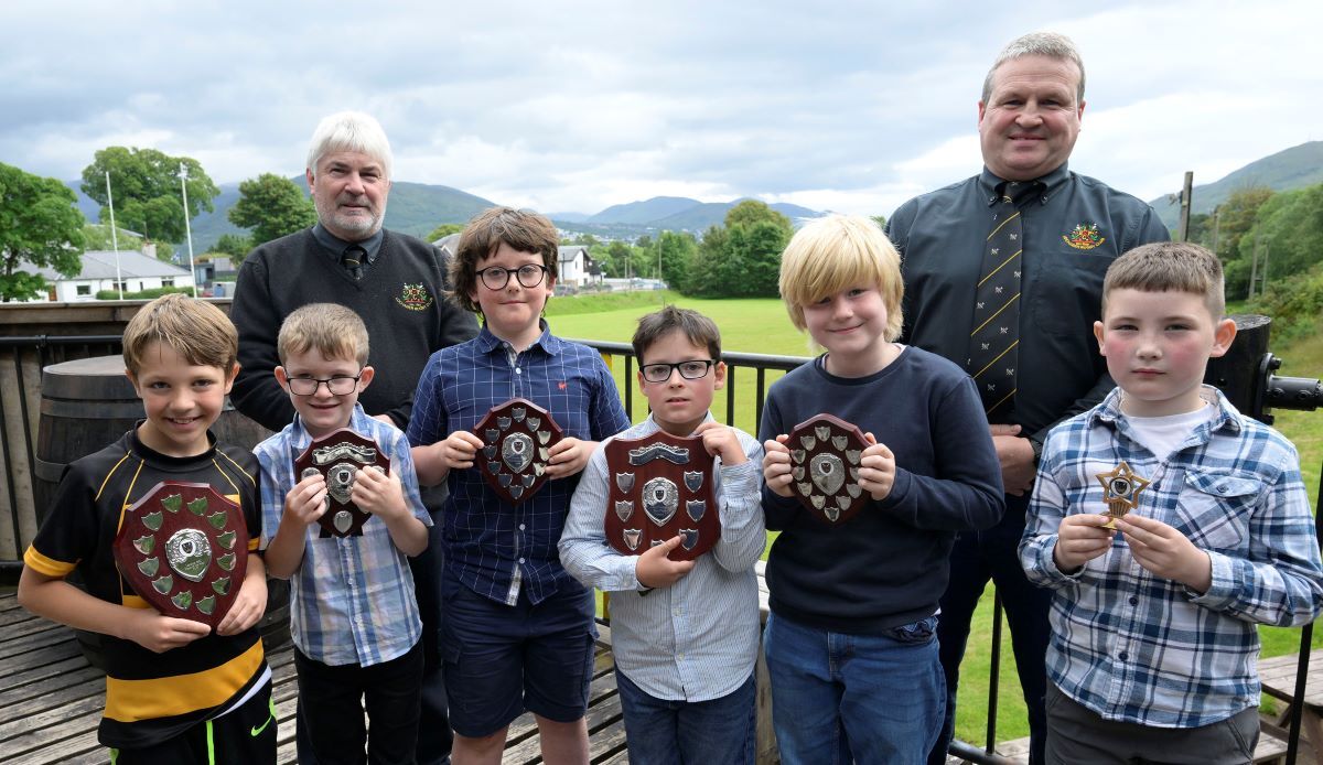 President. Gary Hendrie (left) and Director of Youth Rugby Stevie McAleer with Junior award winners (left-right) Jaxon Colyer, Kyle MacLeiod, Hamish MacDonald, Ben Yearling, Finlay Melton and and Alan Andrews. Photograph: Iain Ferguson, alba.photos.