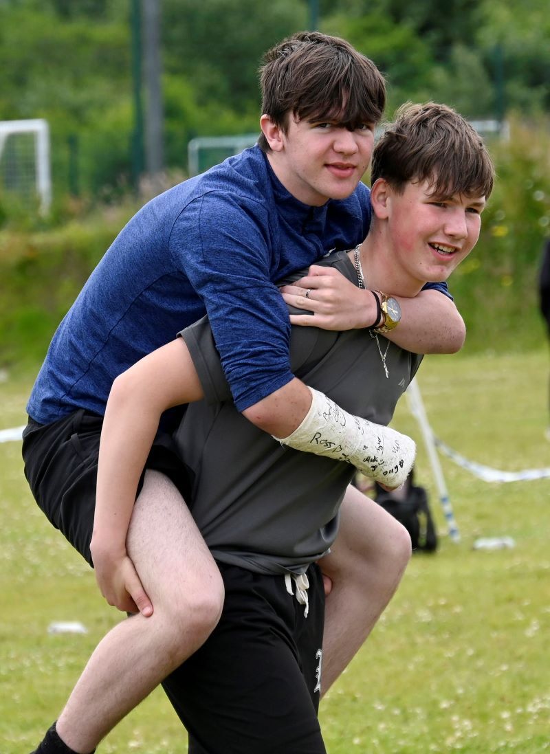 Carrying an injury was no barrier to enjoying the Games Day. Photograph: Iain Ferguson, alba.photos.