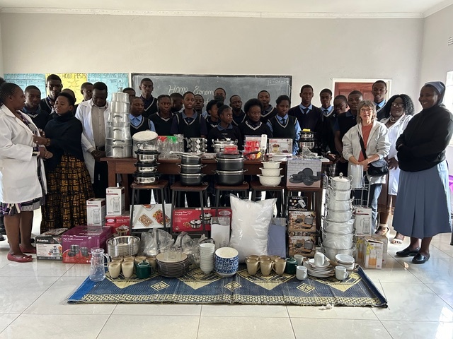 Pupils and staff with the new home economics equipment. Photograph: Marian Pallister