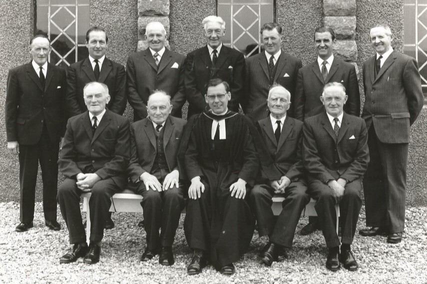 Southend parish kirk session in 1974. Back, from left: John Ronald, Richard Semple, John Barbour, Angus MacVicar, Archie Cameron, Hamish Buchanan and Robert Kelly. Front: James Greenlees, Archie MacKay, Rev John Russell, John Galbraith and Archie Barbour.