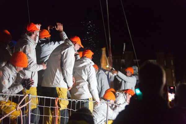 Perseverance crew pop open a bottle of champagne 