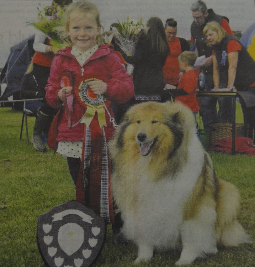 2014: There is no hiding the delight on the face of young Erin Ralston as her Shetland sheepdog Amber won the overall prize at the Campbeltown Pet Show. Erin also picked up the prize for best child handler.