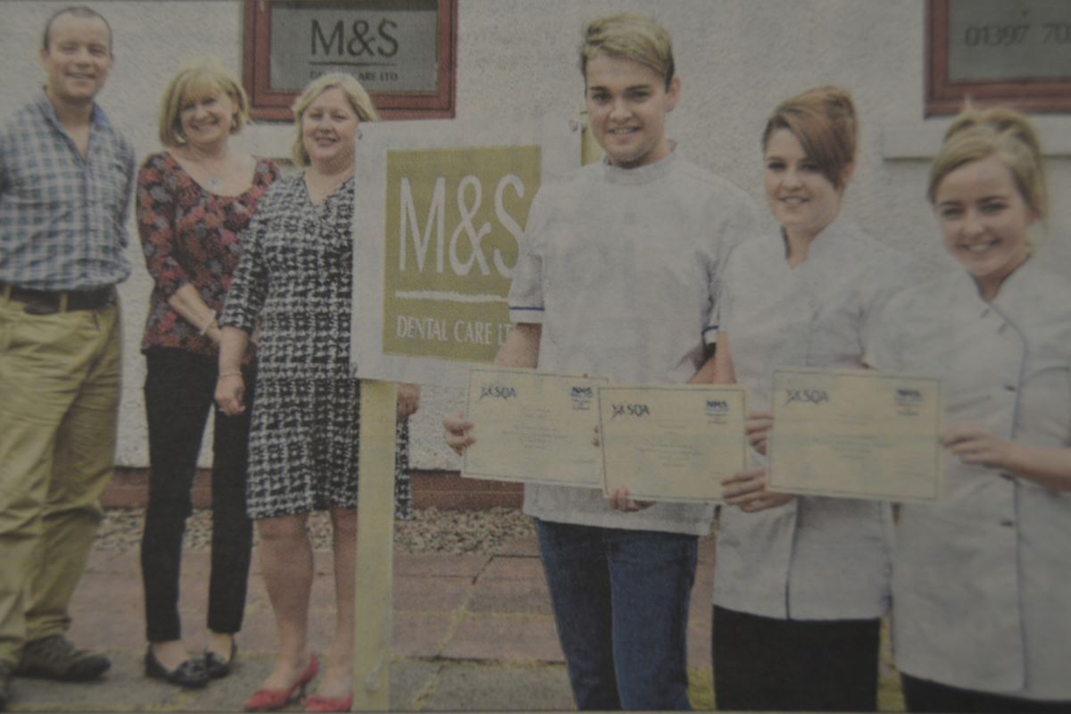 Receiving their SQA Level III certificates were (left-right) Robert MacNeil, Jillian Bruce (centre) of M&S Dental Care with SQA Assessor Margaret Sounderson. Picture: lain Ferguson, The Write Image.