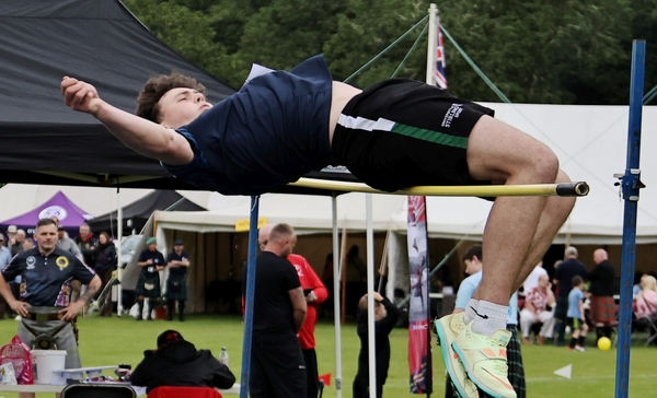 Andrew Nicol on his way to breaking the games’ high jump record. Photograph: Kevin McGlynn