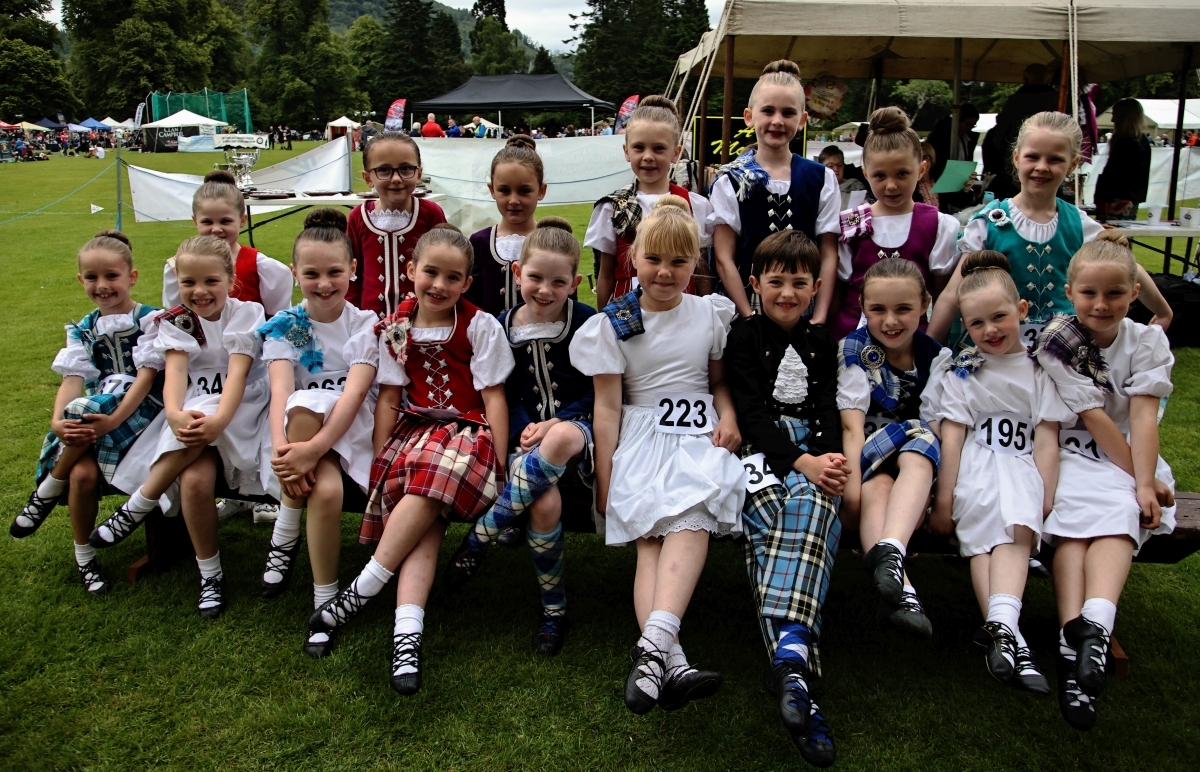 Young dancers having a rest in between dances. Photograph: Kevin McGlynn