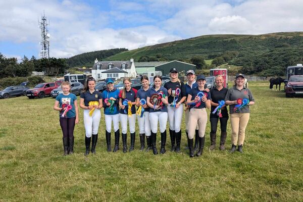 Riders jumping for joy at annual derby