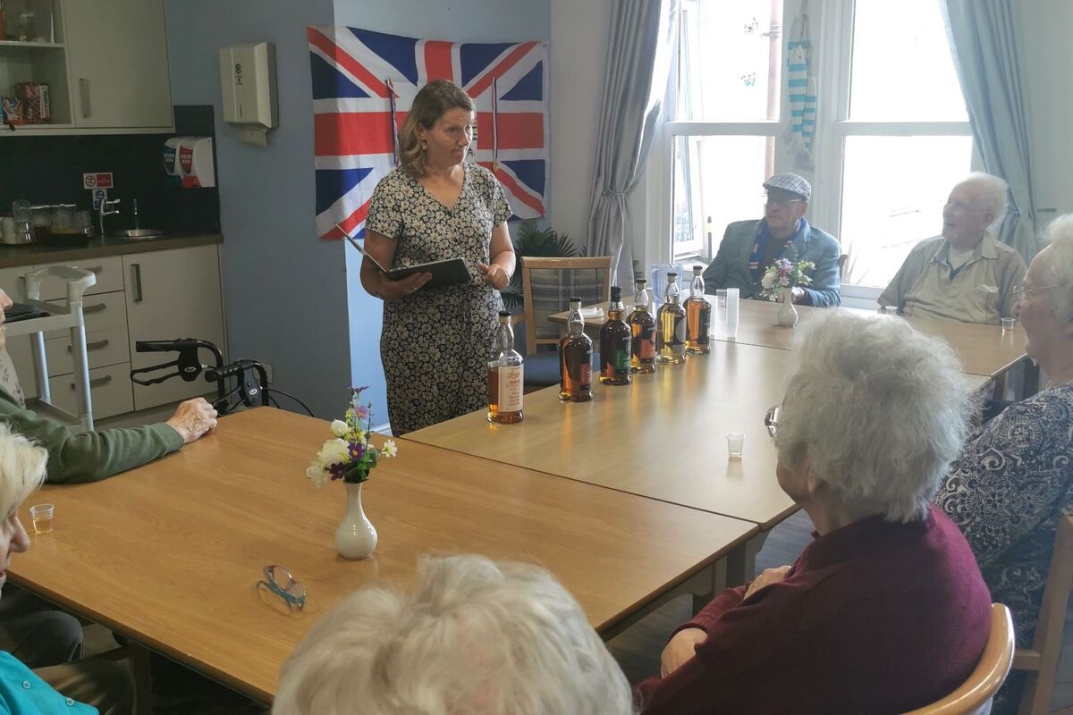 Care home residents enjoy a taste of distillery experience