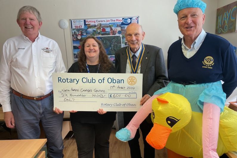 Oban Rotary present a quacking good cheque