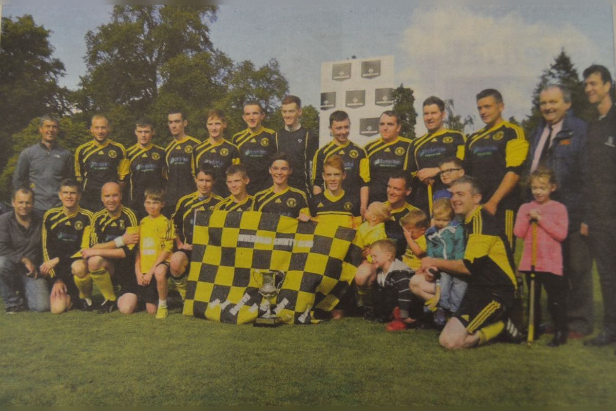 2014: An undefeated Inveraray shinty team is celebrating this week after learning they will be promoted next season to compete in South Division One. The undefeated team posed with friends and family. 