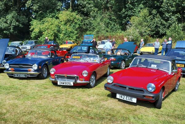 A 1976 MG Midget, 1973 MGB Roadster and two Triumph TR6 Roadsters 1972/3