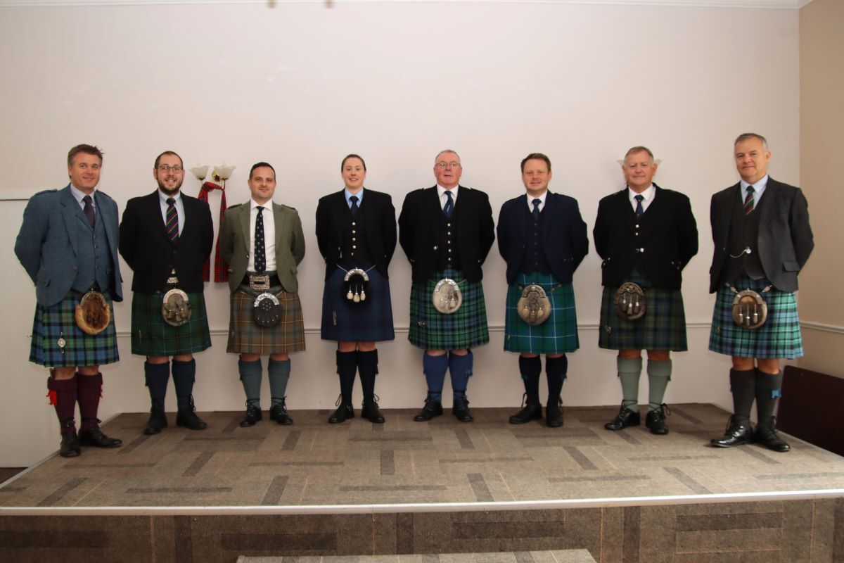 The competing pipers, from left: Innes Smith, Alasdair Henderson, Finlay Johnston, Sarah Muir, Willie McCallum, Callum Beaumont, Roddy MacLeod MBE and Stuart Liddell MBE.