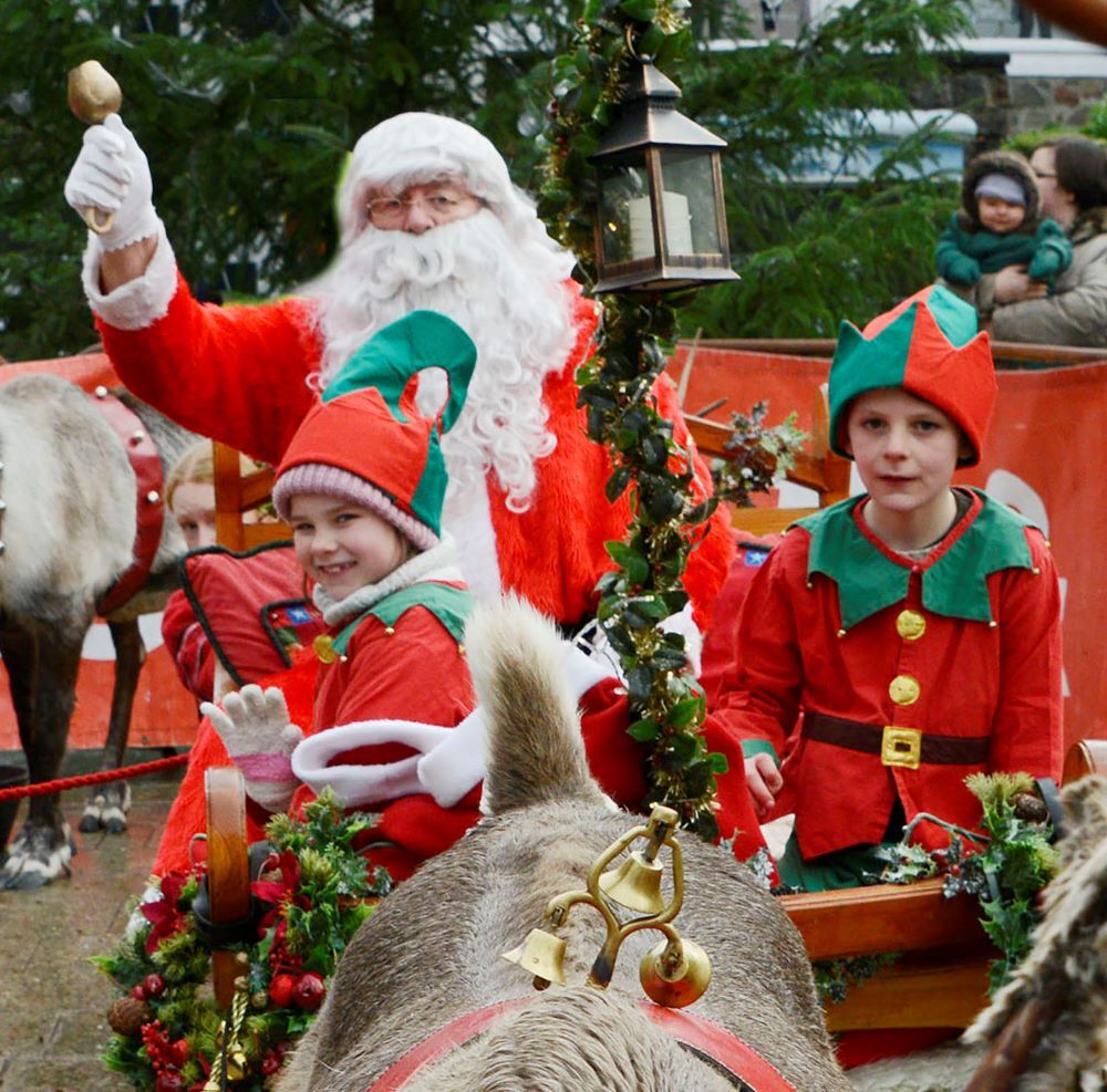 2017: Santa in his sleigh with elves Kayla Duncan (left) of Caol School and Faolan Hunter of Lundavra School get ready to start the parade leadng to the Rotary Club of Lochaber Charity Christmas Fair. Photograph: Iain Ferguson, The Write Image. 2017: Santa in his sleigh with elves Kayla Duncan (left) of Caol School and Faolan Hunter of Lundavra School get ready to start the parade leadng to the Rotary Club of Lochaber Charity Christmas Fair. Photograph: Iain Ferguson, The Write Image.