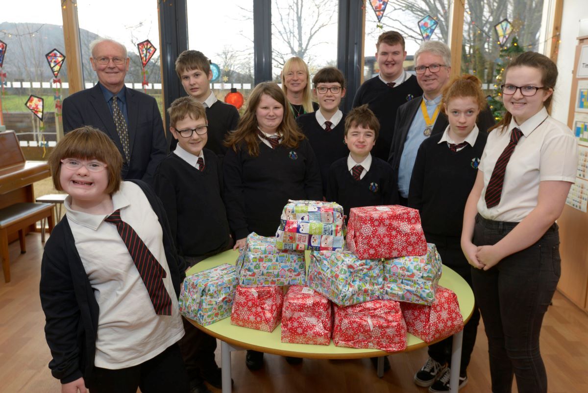 2019: Members of the Rotary Club of Lochaber joined pupils of Lochaber High School for their annual joint venture of supplying, wrapping and delivering 450 Christmas parcels to senior citizens across the school's catchment area. Photograph: Iain Ferguson, alba.photos. 2019: Members of the Rotary Club of Lochaber joined pupils of Lochaber High School for their annual joint venture of supplying, wrapping and delivering 450 Christmas parcels to senior citizens across the school's catchment area. Photograph: Iain Ferguson, alba.photos.