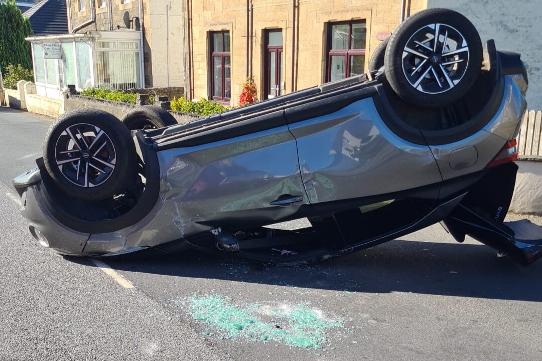 Soroba Road moving again after car flips onto its roof