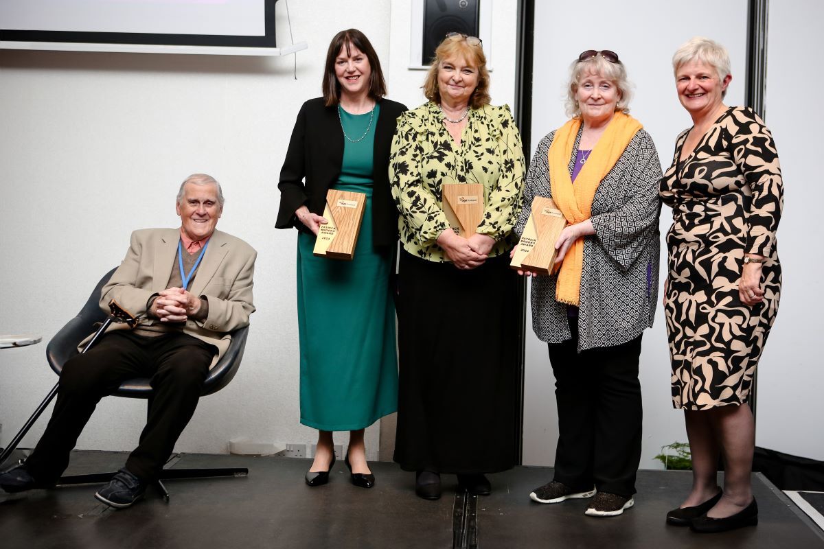 From left: Former television broadcaster and entertainer Glen Michael, Peggy Mackay (Co-ordinator of Western Isles Community Care Forum), Isabel Campbell (Manager of Leverburgh Care Home), Ellie Donnelly (Dementia Advisor, Alzheimer Scotland) and Katherine Crawford (Chief Executive of Age Scotland).