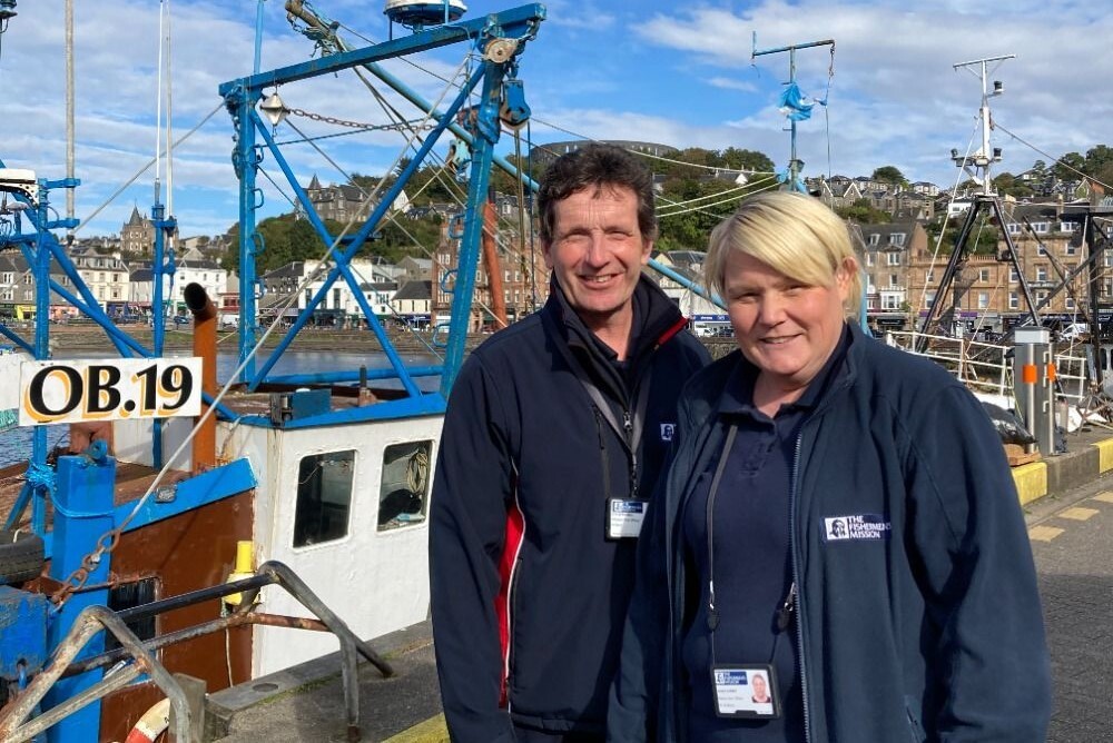 Rev Chris Holden, port officer, left, and Louise Liddell, mission area officer, on the pier in Oban.