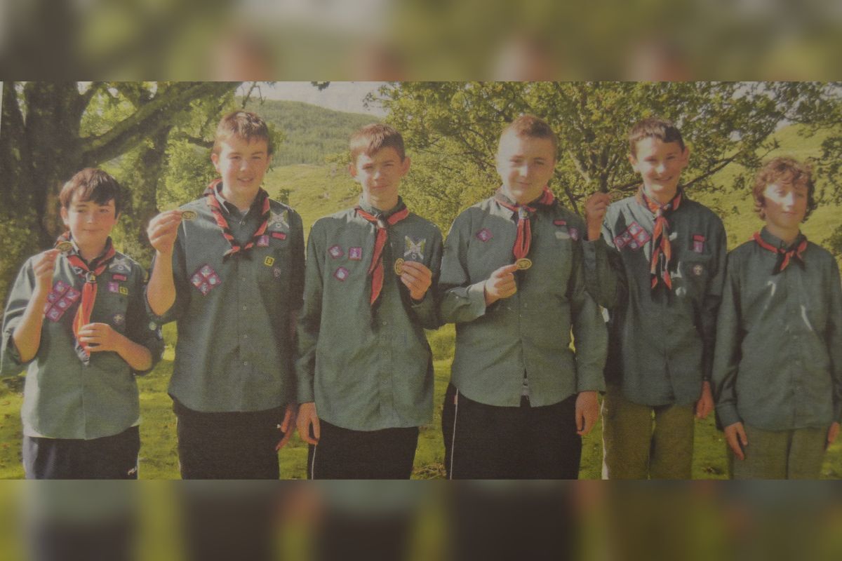 2014: From left: James Urquhart Lorne Barrie, Ethan Glencross, Cameron Kidd, Piers Gritten and David Hubbard each collected their awards after a 20-mile hike.