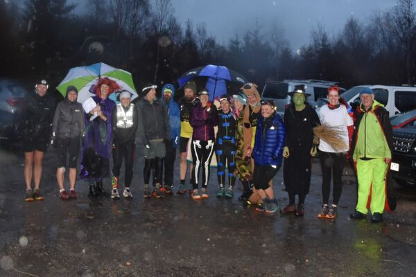 Twilight runners brave wind and rain