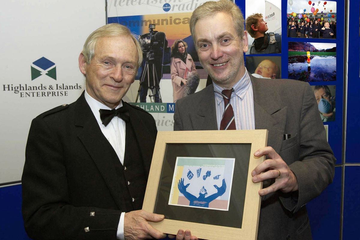 Presiding Officer of the Scottish Parliament 2005, George Reid (left) presents the Highland Photographer of the Year Award to Fort William-based Iain Ferguson. Iain had first taken pictures of George Bruce in 1973 when he was electioneering in Kirkintilloch.