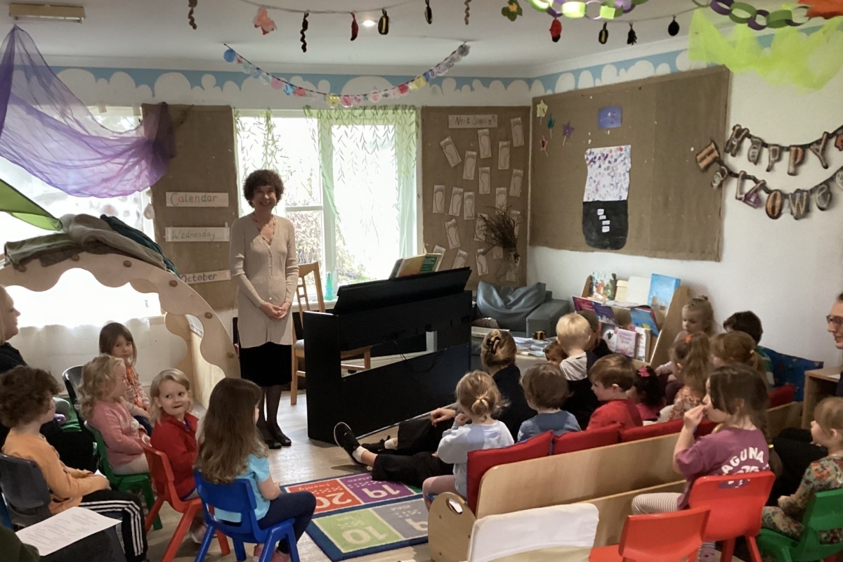 Concert pianist spreads joy of music to nursery children