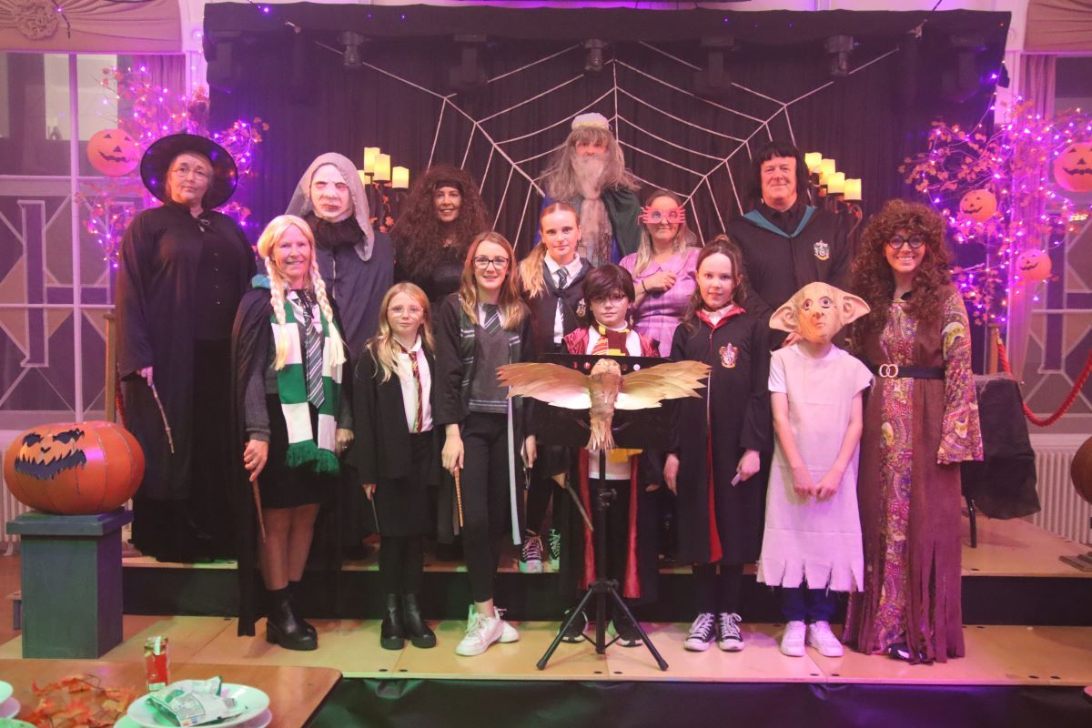 The town hall team transformed themselves into characters from the Harry Potter wizarding world.