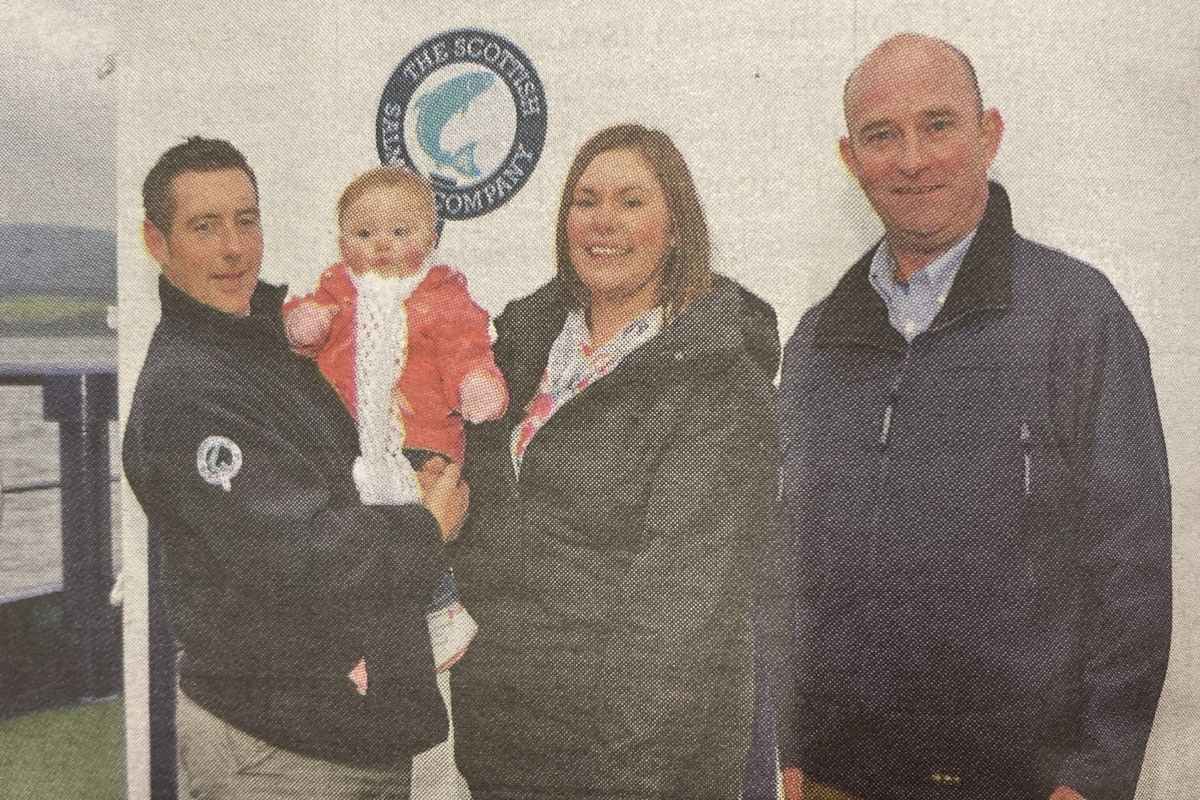 2014: Chris Smyth, Erin Julia Smyth with her mother, Chris’ partner Emma MacPhail, and Iain Macintyre, production manager of The Scottish Salmon Company.