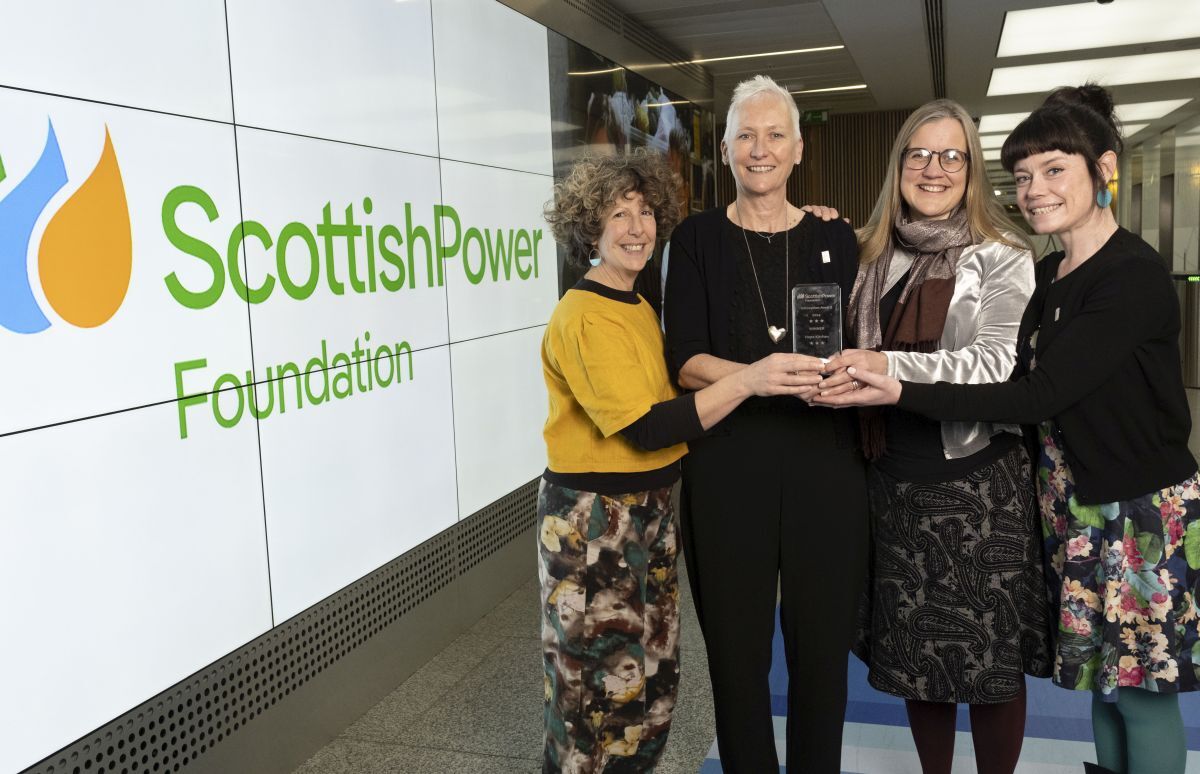 Hope Kitchen and the Re_Store team celebrate their ScottishPower award for innovation.