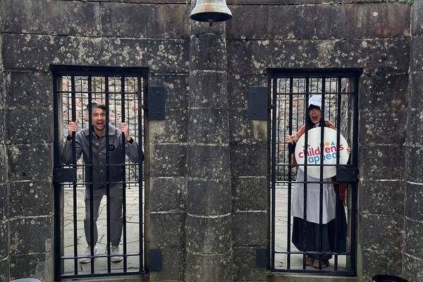 Sean Batty and Laura Boyd behind bars in Inveraray - but all for a good cause