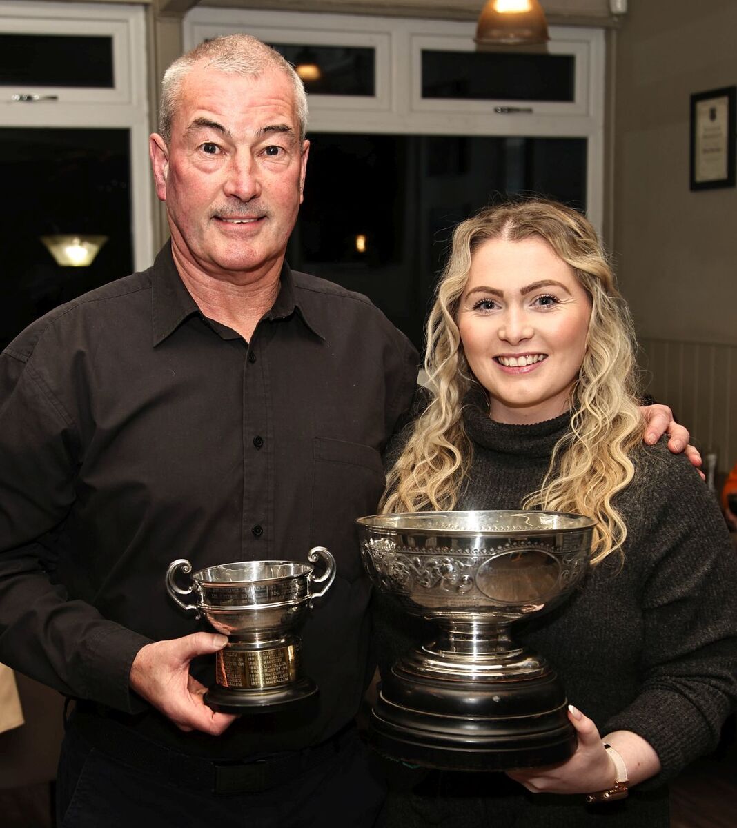 Glencruitten Golf Club champion Philip Murphy and Ladies Club Champion Nicola MacIntyre. Photograph: Kevin McGlynn