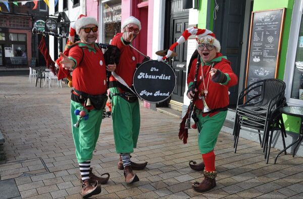  The Absurdist Pipe Band put a smile on shoppers' faces as they toured around the festive markets.