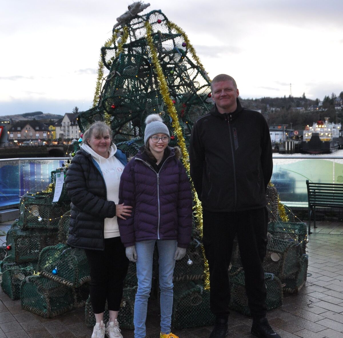 Alison Wotherspoon with daughter Ailsa Mackichan and Allan Strang from F.A.I.R next to the charity's Christmas tree in Stafford Street.