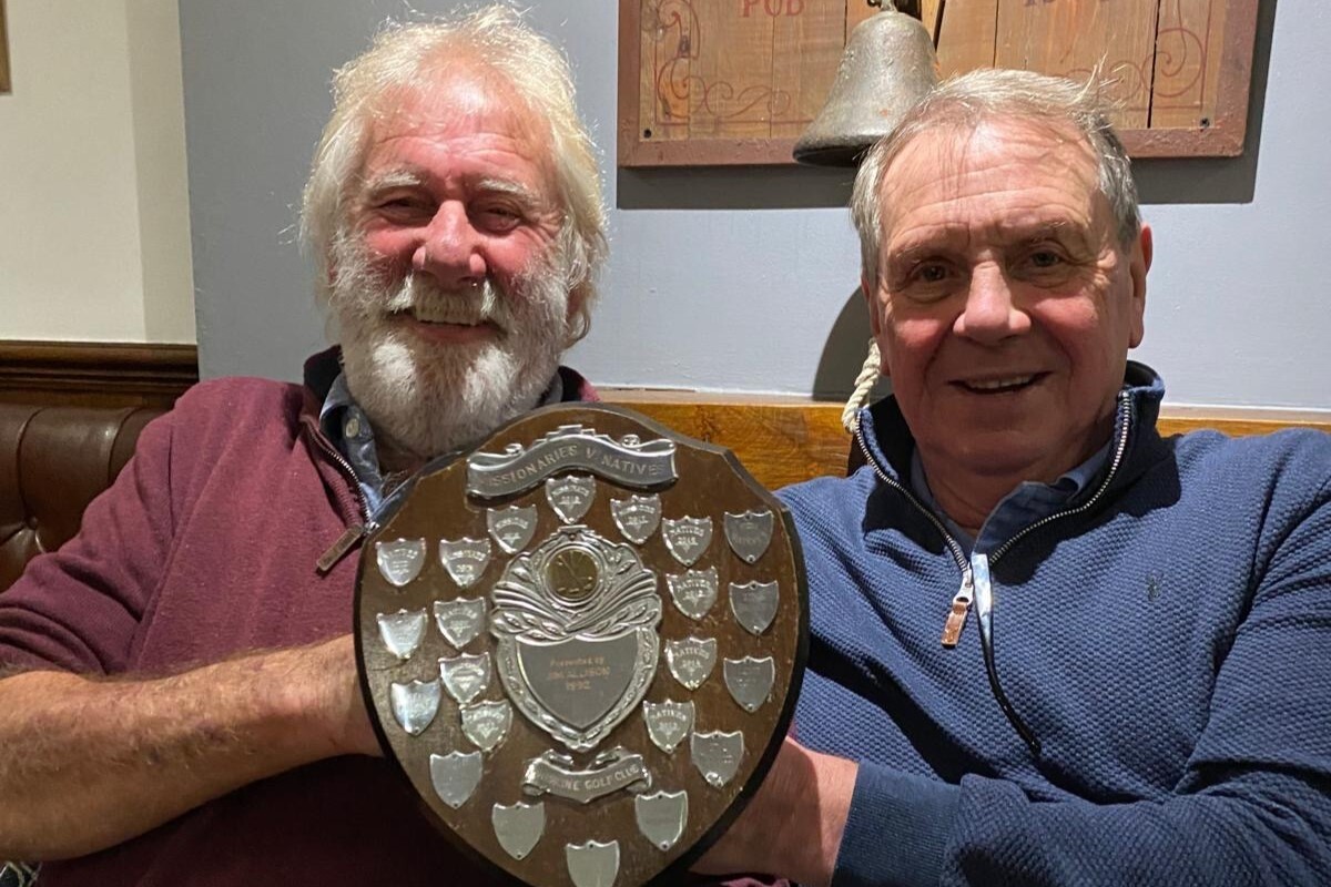 Gator Kerr and Joe Faulkner of Shiskine with the Missionaries v Natives Trophy. Photograph: Shiskine Golf Club.