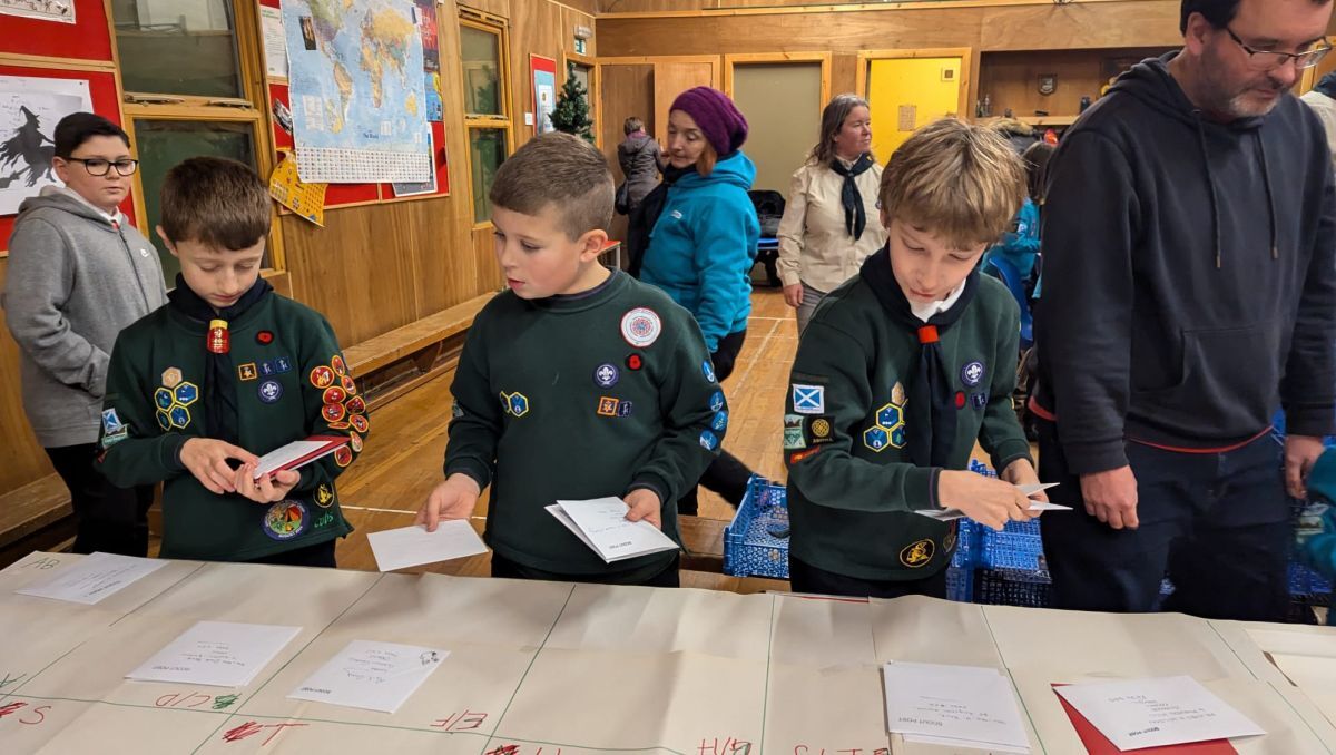 Sorting out the Christmas post at 1st Argyll Scouts' festive mail HQ. Photograph: Fee Shaw