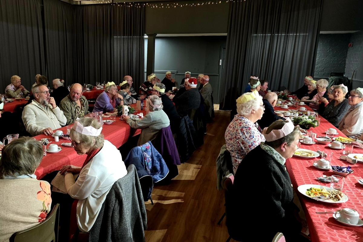 Pensioners enjoy Christmas lunch in new surroundings