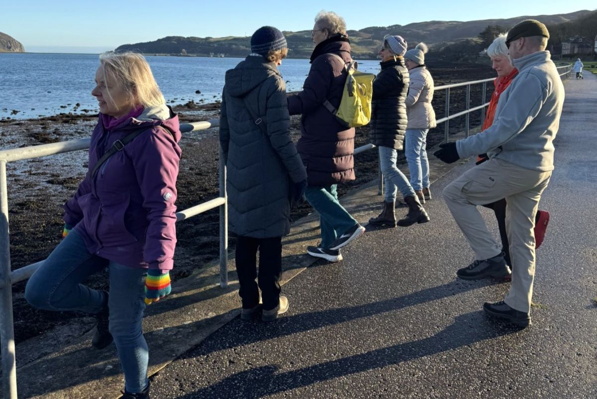 Members complete warm-up exercises…