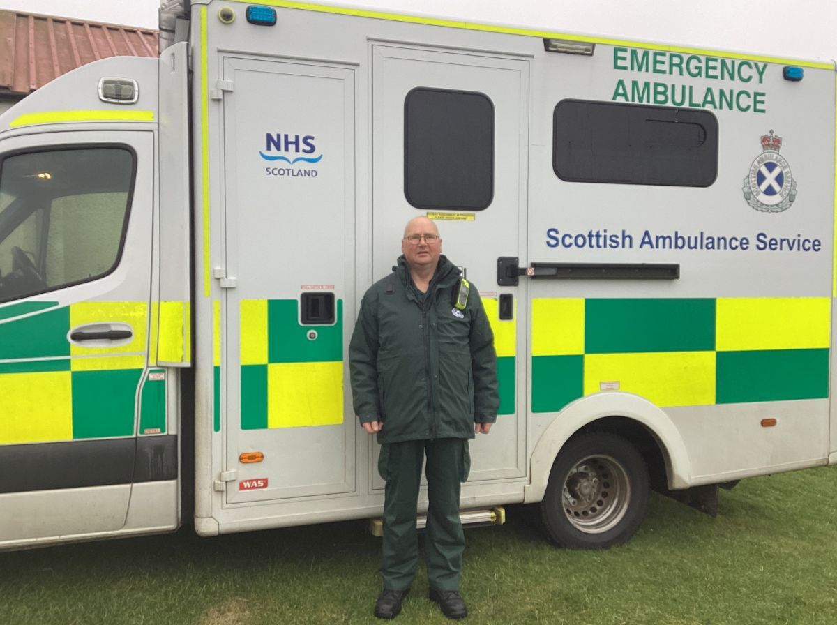 Neil Munn with the Tiree ambulance.