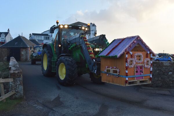 Farmers brave wild weather for Tractor Run fundraiser