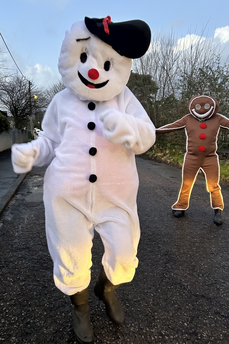 Snowman and Gingerbread man had a wee dancing on their Ardrishaig and Lochgilphead visits on Saturday, despite the blustery weather. Photograph: Colin MacFarlane Snowman and Gingerbread man had a wee dancing on their Ardrishaig and Lochgilphead visits on Saturday, despite the blustery weather. Photograph: Colin MacFarlane