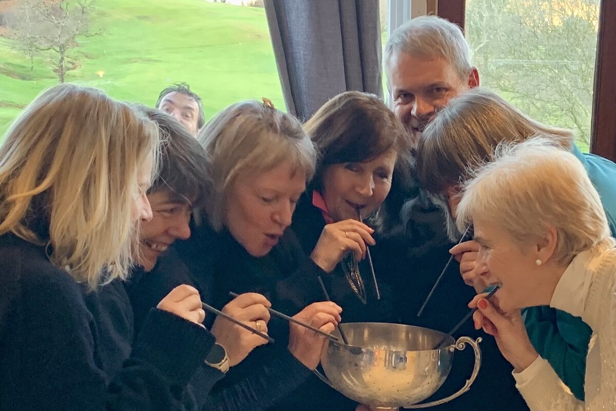 Lamlash ladies help Paul Jameson celebrate his hole-in-one at the 7th tee at Lamlash. Photograph: LGC. 