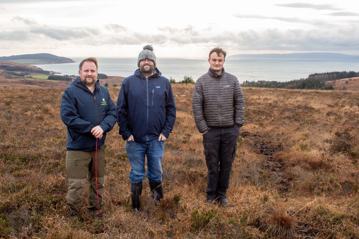 Andrew Adamson, Caledonian Climate, with Lagg Distillery manager Graham Omand and Duncan Laird of Angus Estate Plant. Photograph: Caledonian Climate. 