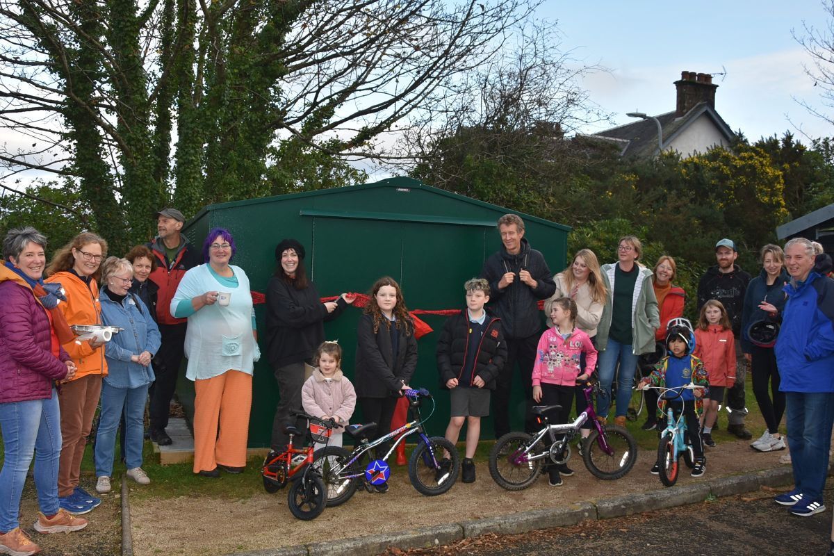 Supporters and young children with their new bikes at the launch of the Eco Savvy bike library last year.