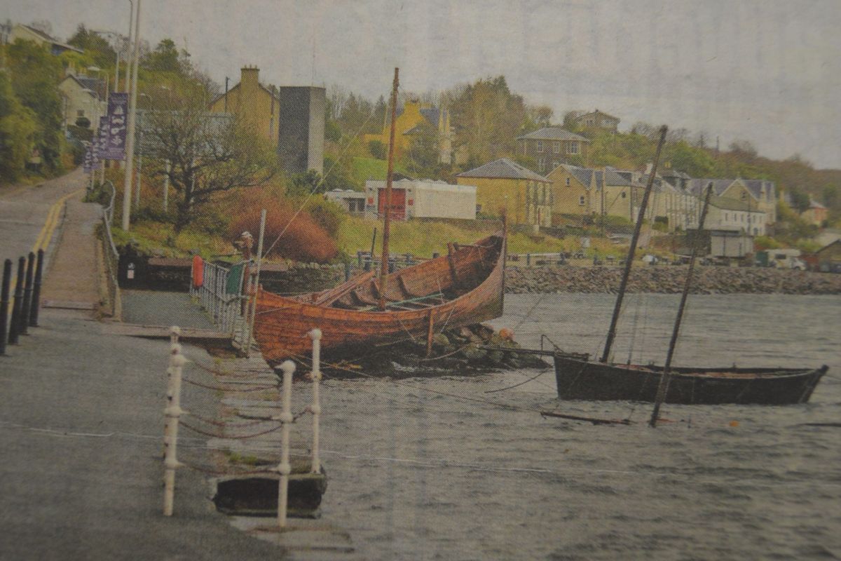 2015: Tarbert’s Viking boat was washed up on the rocks while one other traditional boat that is moored beside it sank to the bottom of the harbour.