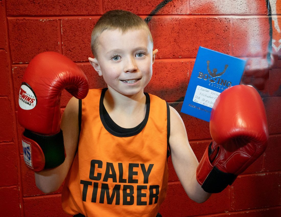 Ten-year-old boxer Charlie Varley proudly displays his registration 'passport'. Photograph: Iain Ferguson, alba.photos.