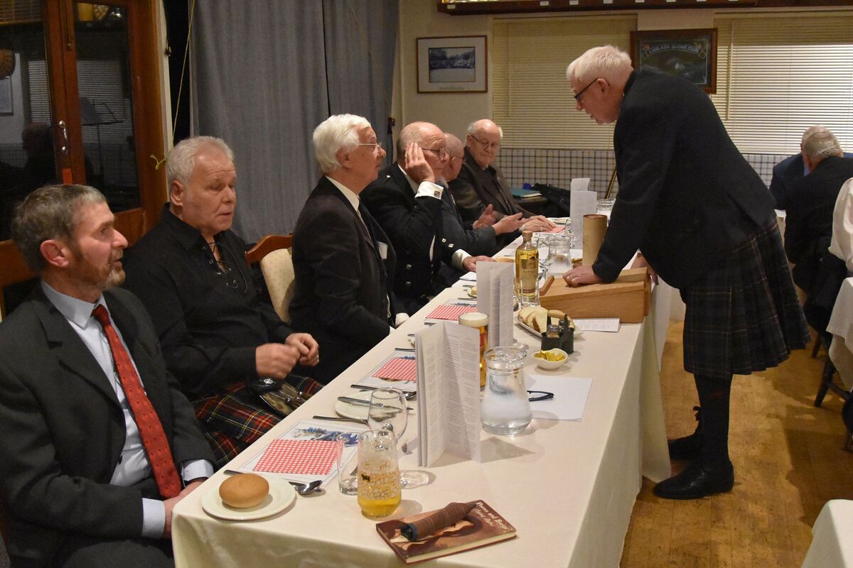 Lamlash Burns Club treasurer Andy Martin chats with members at the top table: Graham Kerr, Alastair Crawford, Robert Buntin, Tony van Bregel, Keith Wallbank and George Ferguson. Lamlash Burns Club treasurer Andy Martin chats with members at the top table: Graham Kerr, Alastair Crawford, Robert Buntin, Tony van Bregel, Keith Wallbank and George Ferguson.