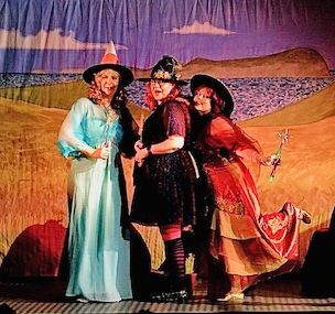 Good witches Glinda, Brenda and Rhonda (Jenn Brunner, Rachel Smith and Caroline Morgan) help Dotty with a plan to find the Conjuror in Seil's 2025 panto.