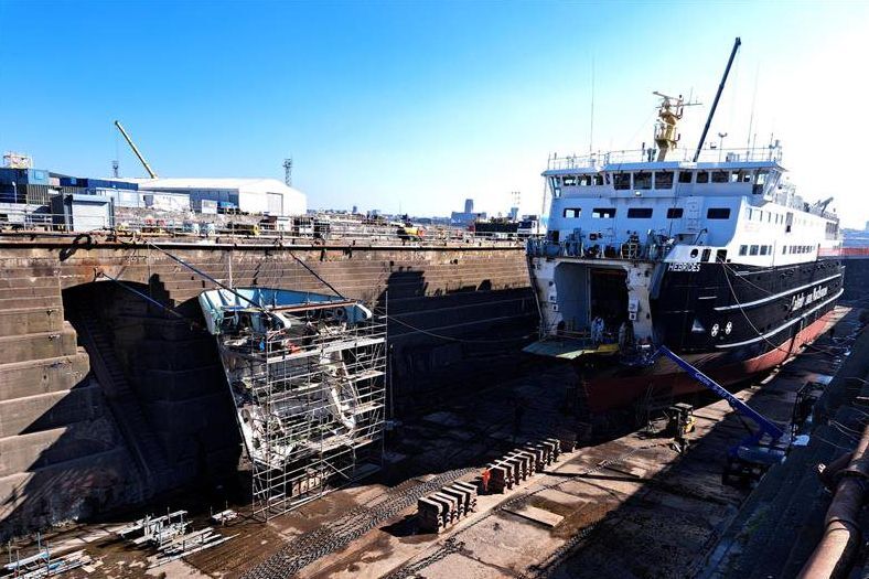 MV Hebrides with bow visor removed and below, with stern ramp removed. Photograph: CalMac