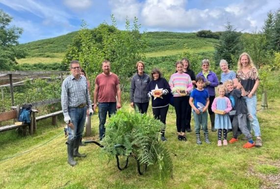 The tree nursery and community orchard volunteers on plots near Dervaig, growing their projects well.
